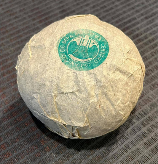 2009 Tongqinghao Yiwu Golden Melon Raw Puer