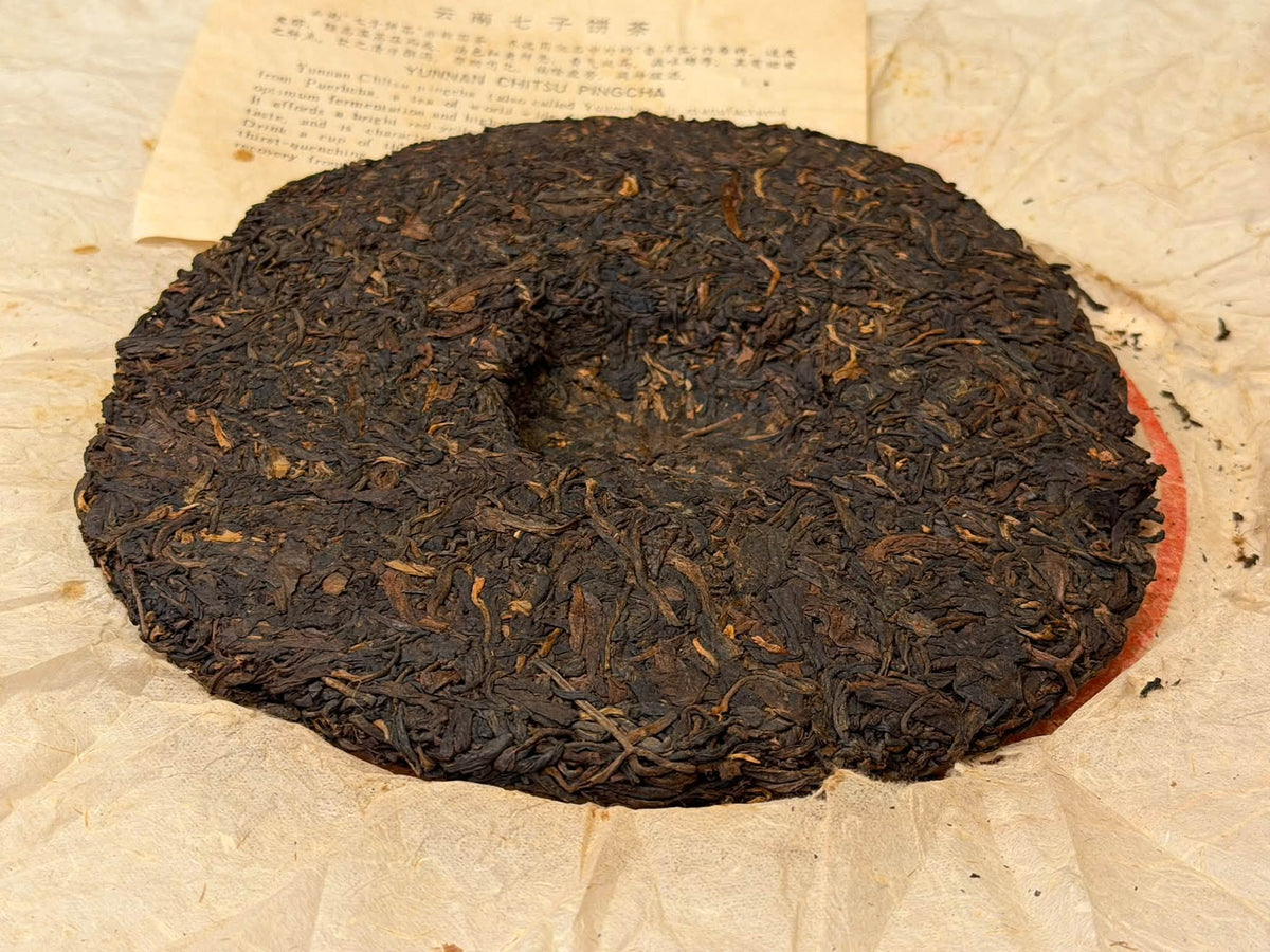 Late 1980s Menghai 7542 "88 Qingbing" Thin Paper Raw Puerh Cake